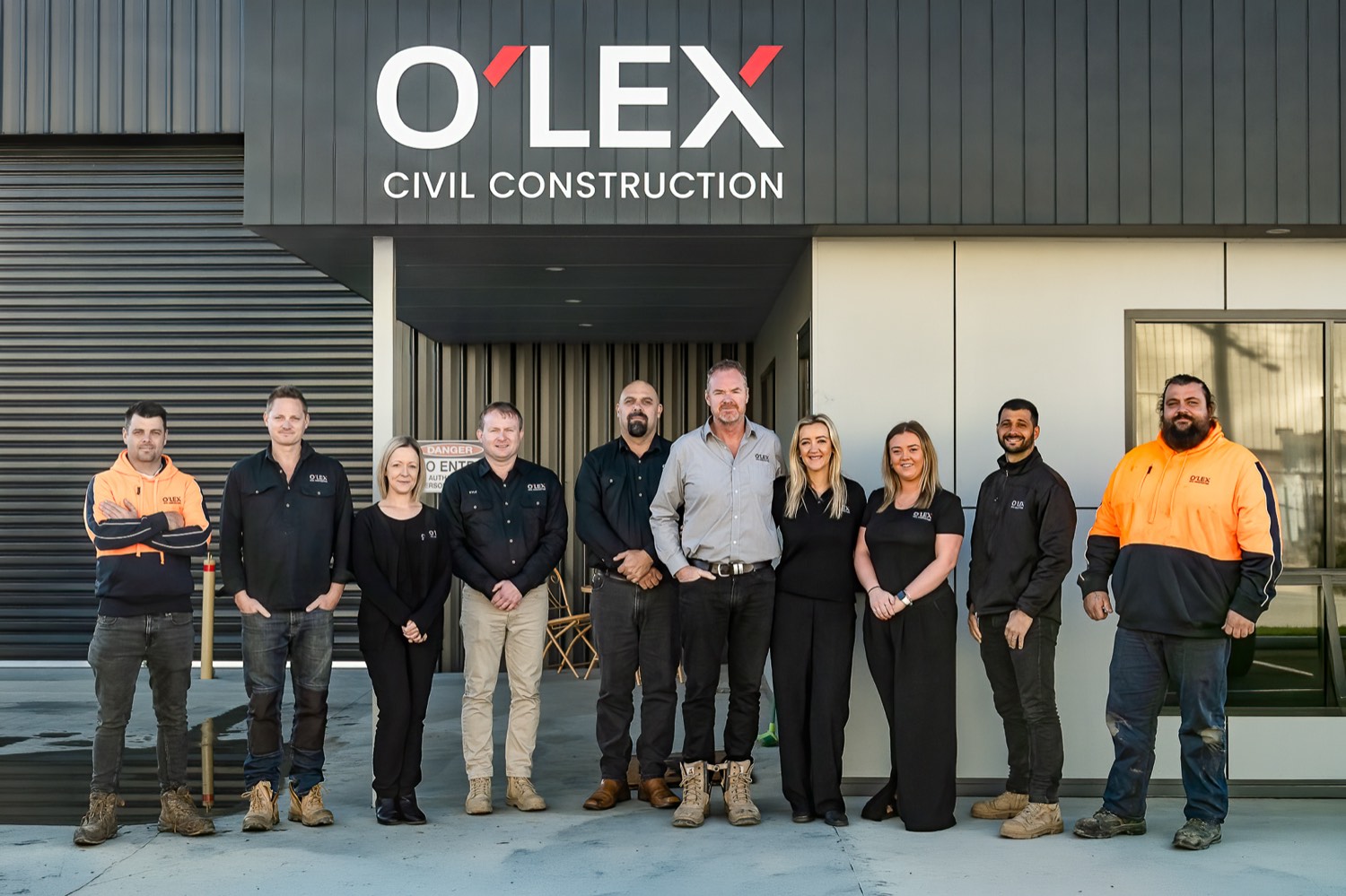 The O'Lex Civil Construction team outside their office