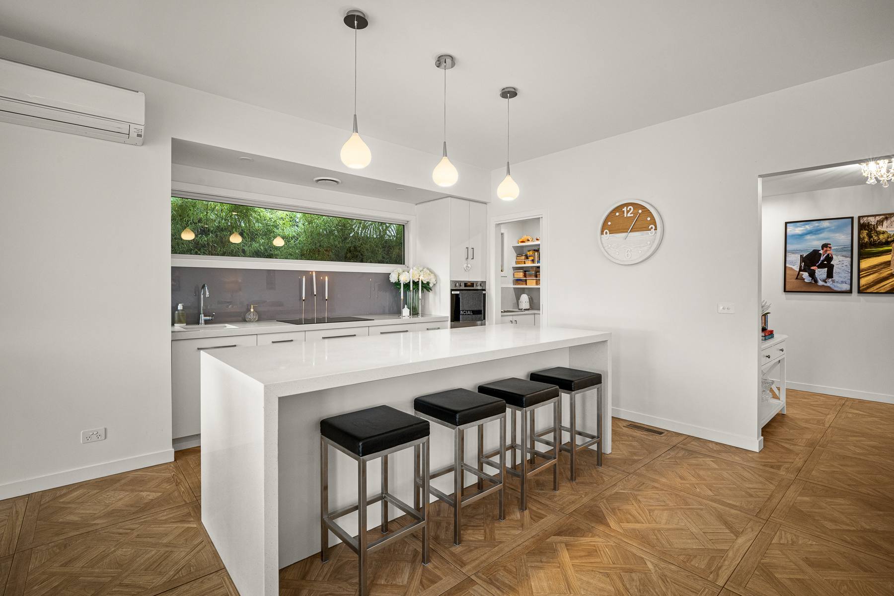 Modern kitchen with island and pendant lighting